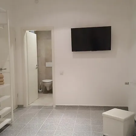 Апартаменты Gaesteappartements Bierfaessl Зинсхайм